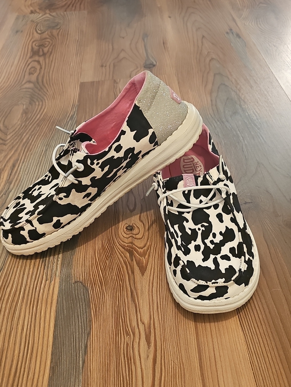 Hey Dude Black & White Cow Print Sneakers with Pink Lining